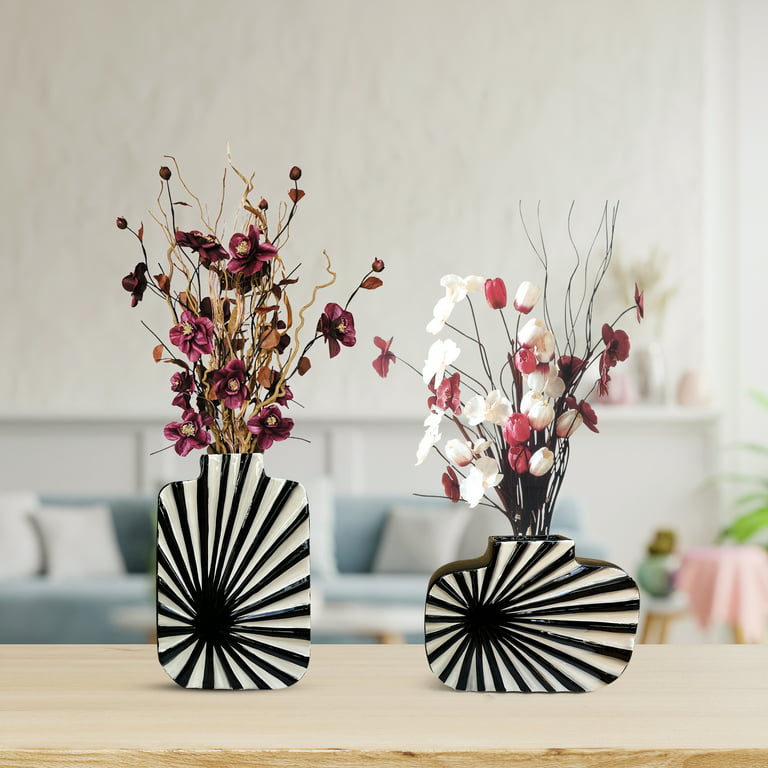 Elegant Black and White Vases with Stunning White Flowers on a