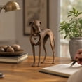 thumbnail image 1 of Vintage Dog Sculpture with Hanging Heart Charm, Antique Patina Resin Art Piece with Delicate Heart Detail for Adding Warmth to Any Space, 1 of 7