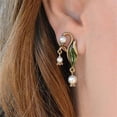 thumbnail image 1 of New Vintage Female Ethnic Bronze Metal Leaf Pearl Earrings, 1 of 3