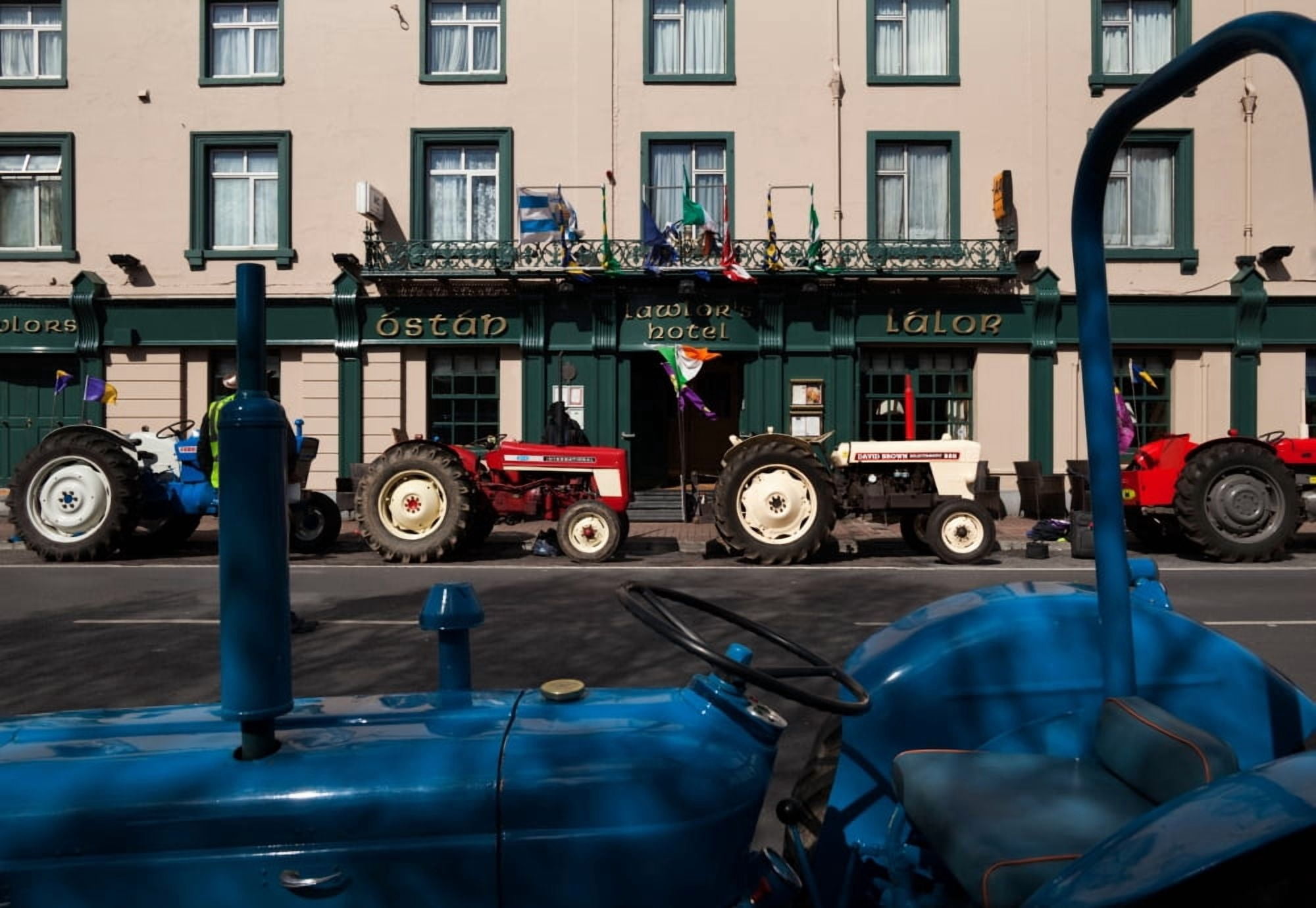 Vintage Tractors lined up outside Lalors Hotel Dungarvan County Waterford Ireland Canvas Art - Panoramic Images (19 x 27)