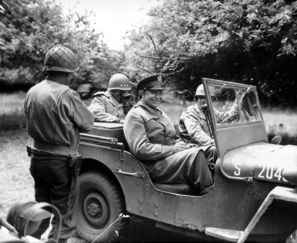 Vintage World War II photo of General Dwight D Eisenhower sitting in a jeep Canvas Art - John ParrotStocktrek Images (31 x 26)