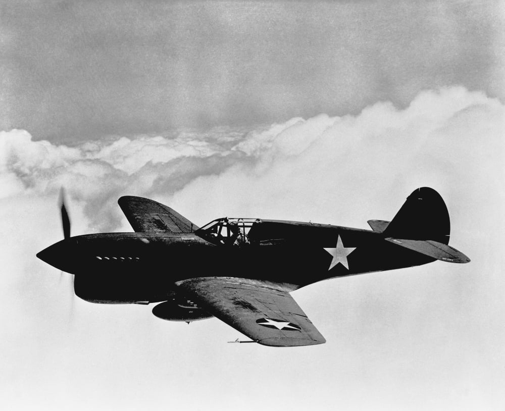Vintage World War II photo of a P-40 fighter plane Canvas Art - John ParrotStocktrek Images (16 x 13)