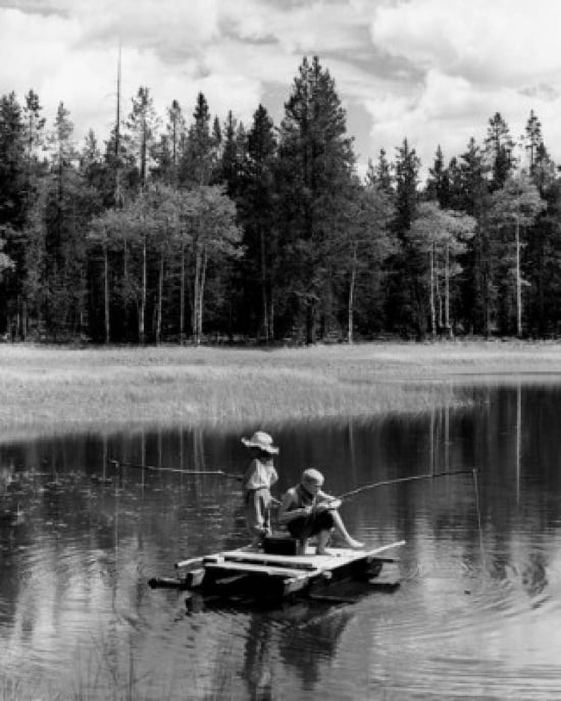 Vintage photograph of boy and girl sitting on wooden raft fly-fishing with improvised fishing rods on lake Canvas Art - (18 x 24)