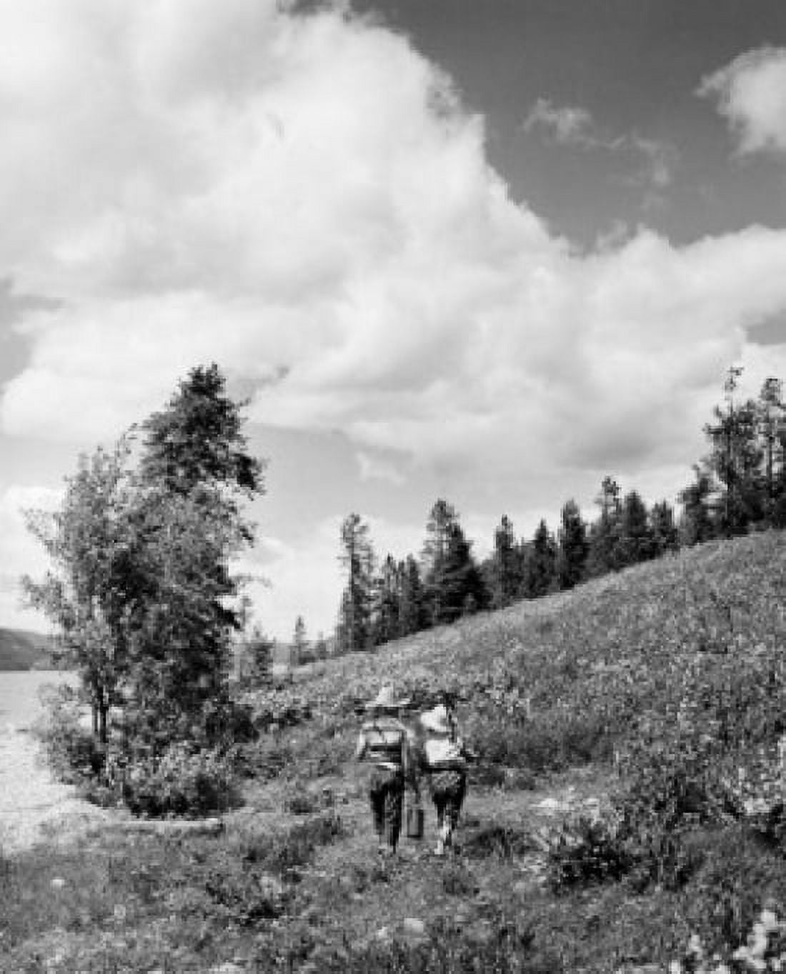 Vintage photograph of boy and girls walking in mountain landscape Canvas Art - (18 x 24)