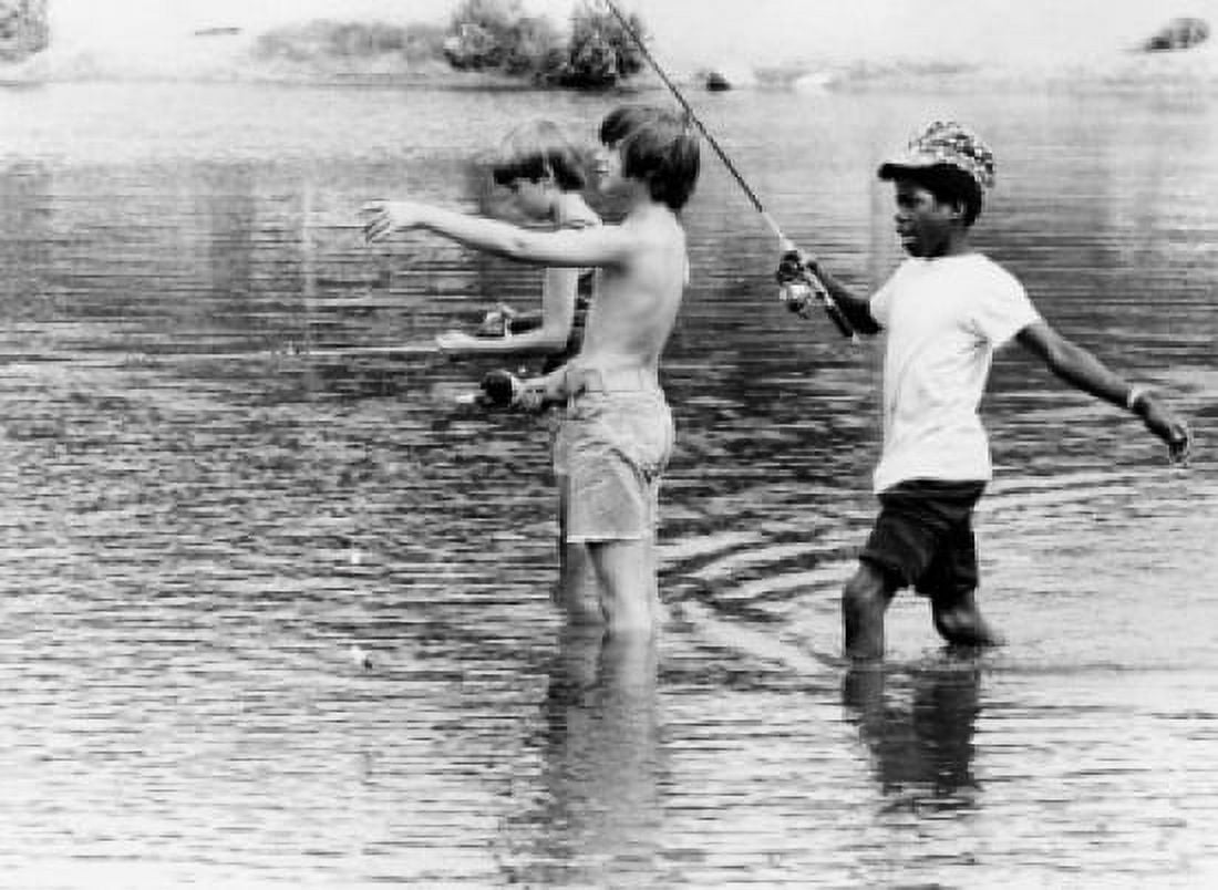 Vintage photograph of boys standing in water fly-fishing Canvas Art - (24 x 36)