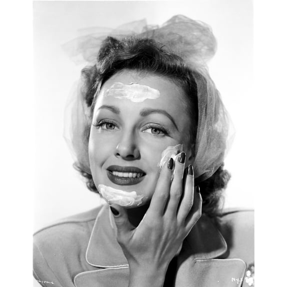 Virginia Grey Putting Moisturizer on Face Photo Print (8 x 10)