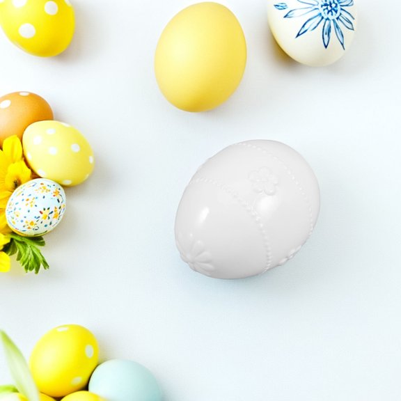 WEUVEB White Porcelain Easter Egg Ornament for Elegant Tabletop and Seasonal Decor