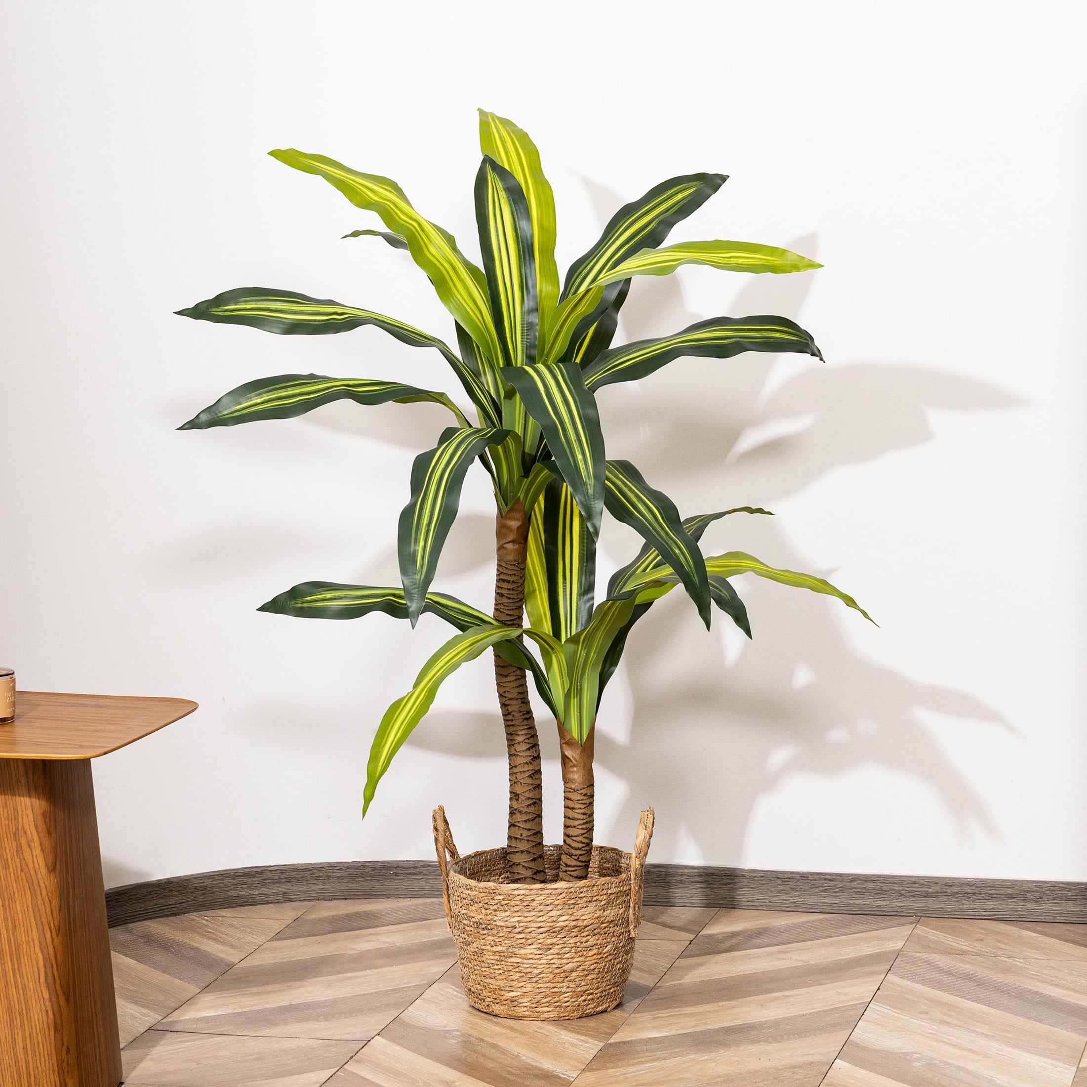 Photo 1 of ***(MISSING SOME GREENERY, SOME PEBBLES IN BOTTOM OF POT LOOSE, WICKER PLANTER BASKET NOT INCLUDED)*** WOKERUI 48” Artificial Dracaena Tree in Black Planter Pot