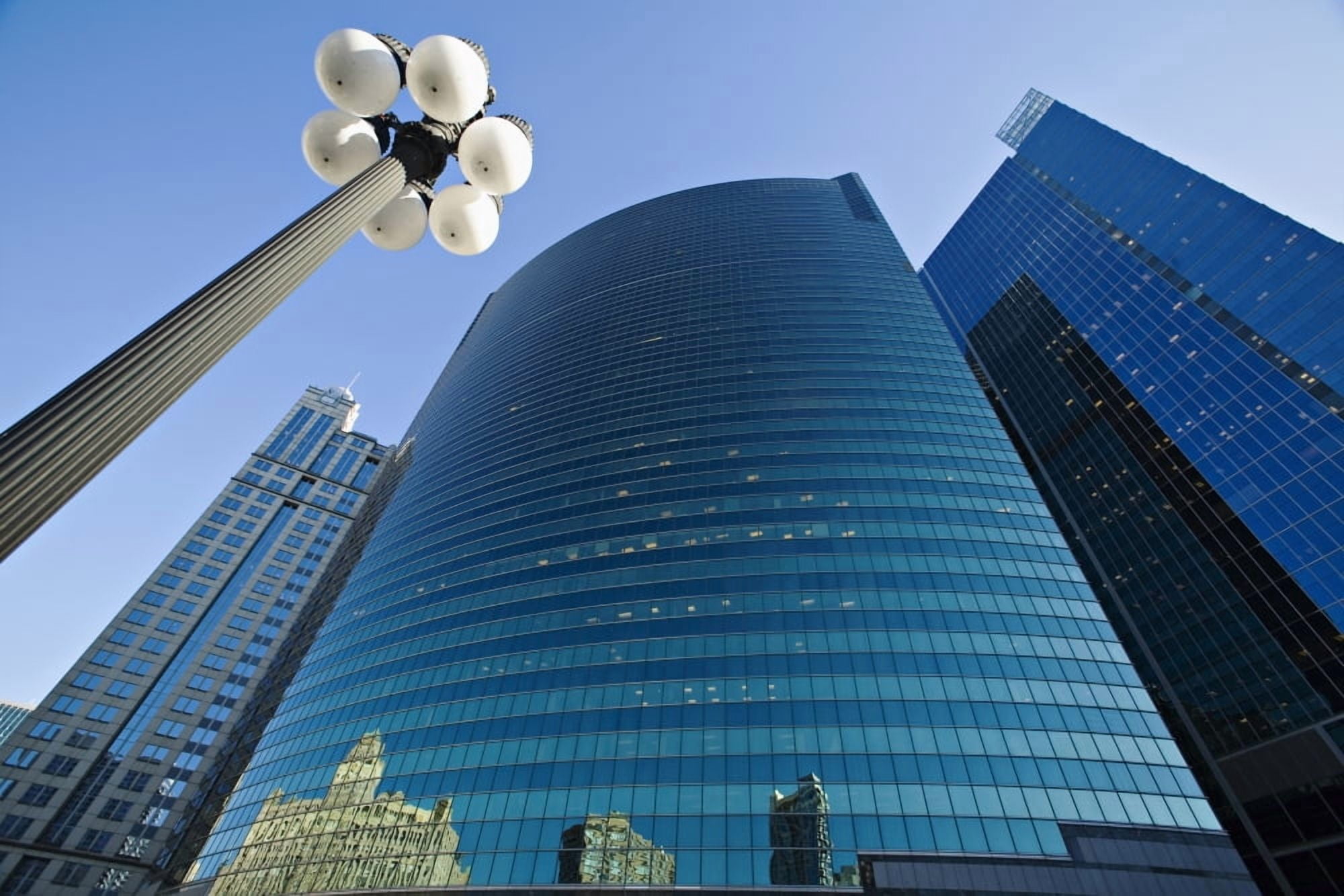 Wacker Drive Building With Street Lamp In Foreground Low Angle View Canvas Art - Kim Karpeles Design Pics (19 x 12)