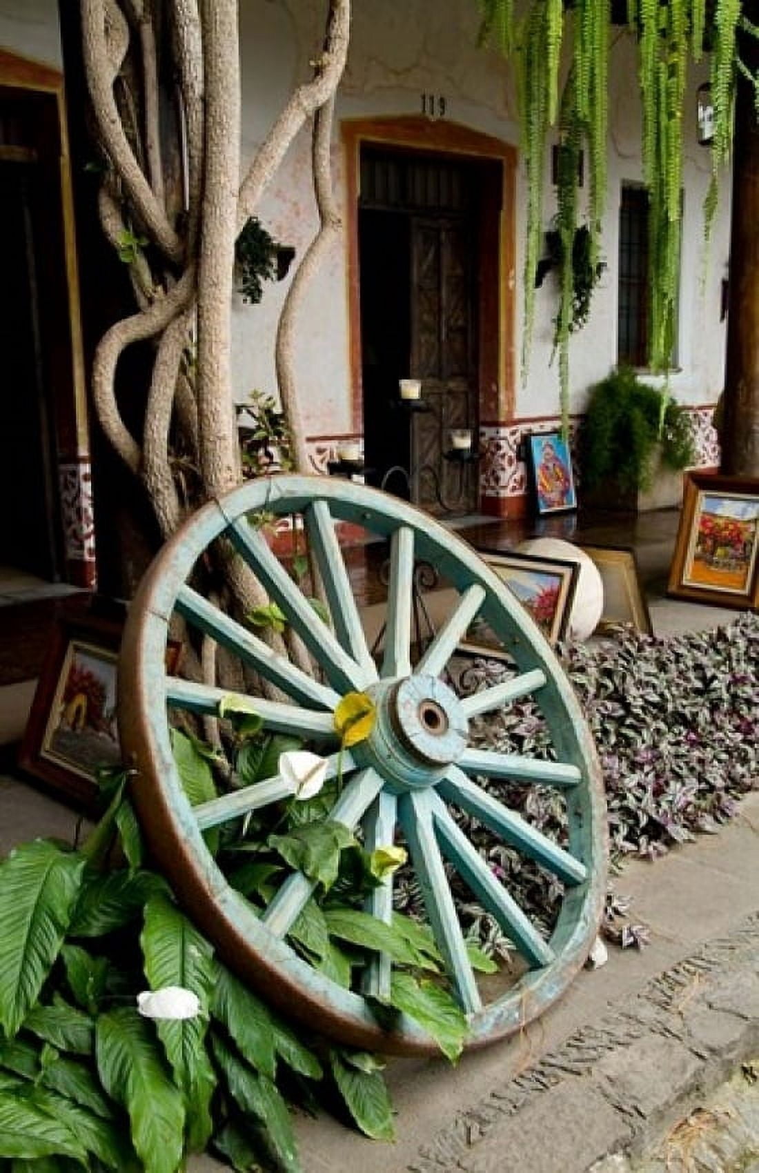 Wagon Wheel La Posada De Don Rodrigo Hotel Antigua Guatemala Canvas Art - Bill Bachmann DanitaDelimont (24 x 36)