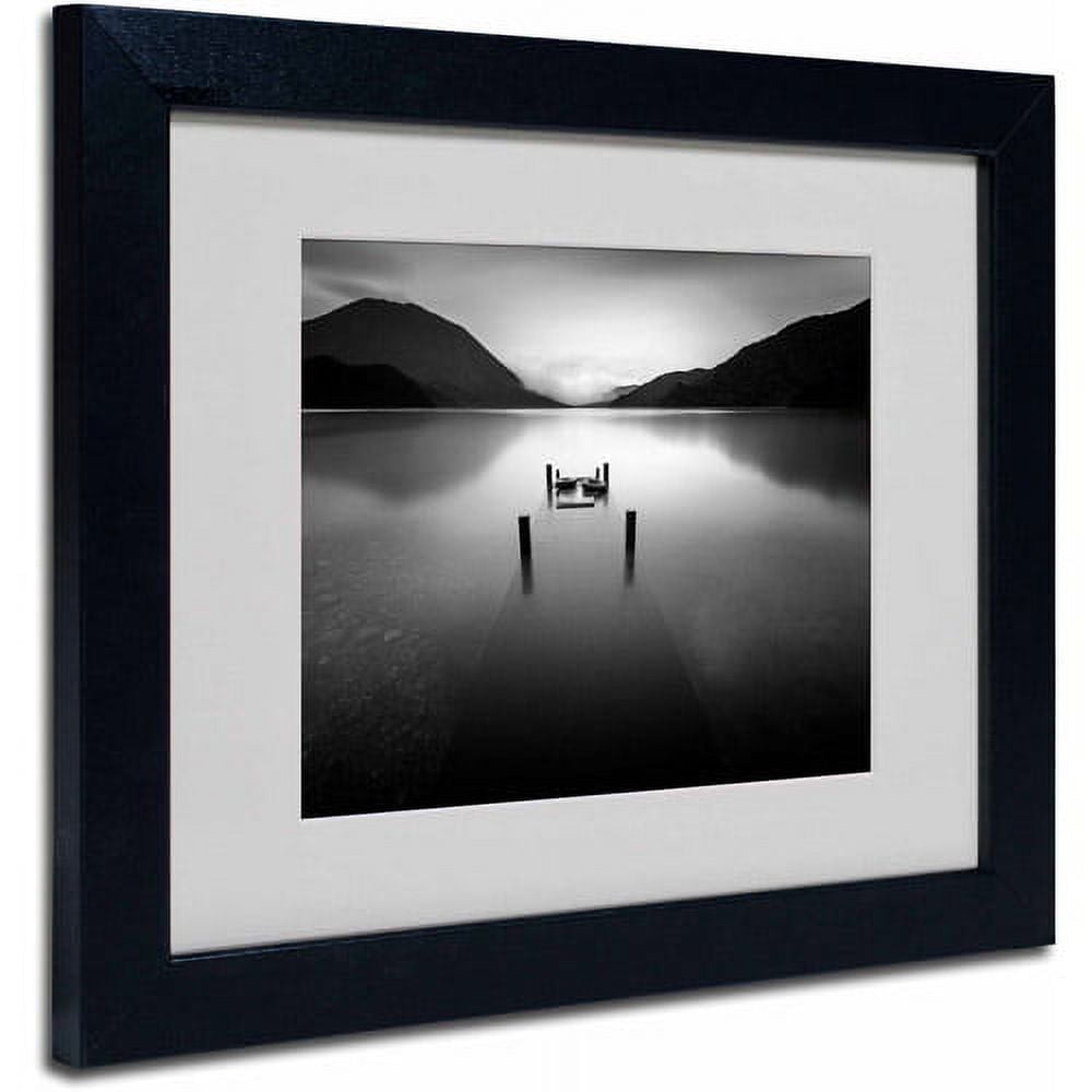Matted art under acrylic in a black frame