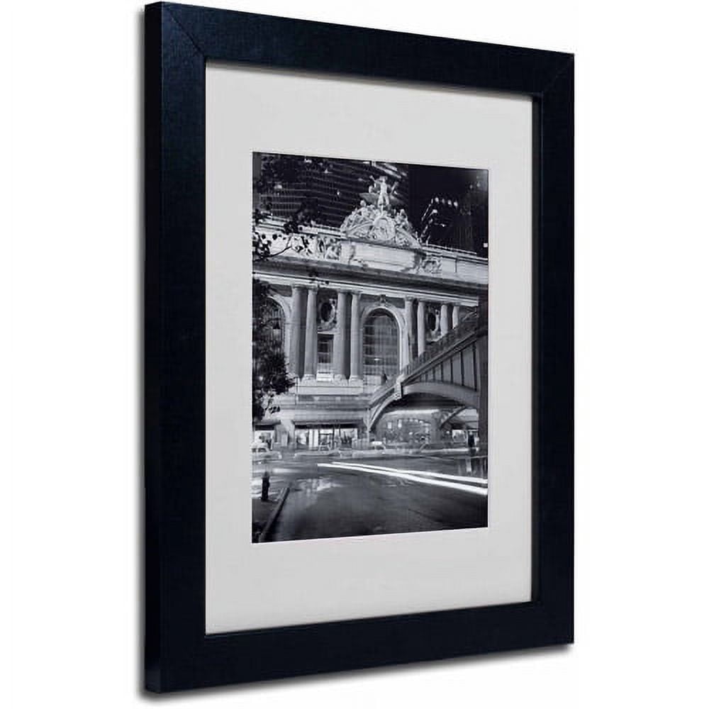 Matted art under acrylic in a black frame