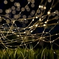 thumbnail image 1 of Pure Garden 2-Pack of 100 Solar-Powered Starry String Lights (Warm White), 1 of 7