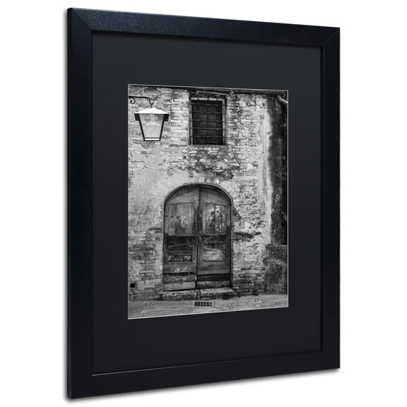 Trademark Fine Art "San Gimignano Door" Canvas Art by Moises Levy Black Matte, Black Frame