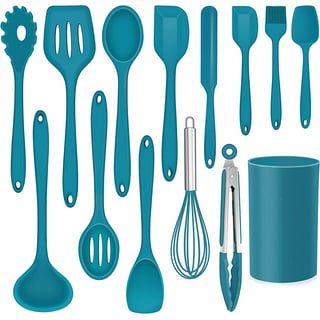 Set of Blue Kitchen Utensils in a Ceramic Cup and Plates Stock