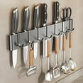 thumbnail image 1 of Wall Mounted Knife Rack, Multi-Functional Kitchen Organizer with No Nail Adhesive Mounting, Minimalist Storage for Utensils, Durable Carbon Steel Design, 1 of 10