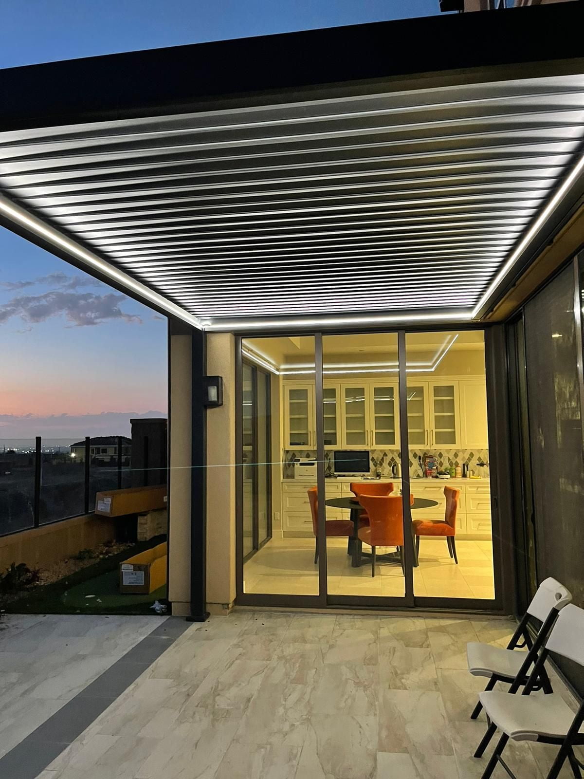 Dark Gray Wall Mounted Aluminum Pergola with Motorization and LED Lighting, 10' x 13'