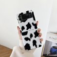 thumbnail image 1 of Warm Plush Folding Case for Samsung Galaxy Z Flip 4, Milk Cow Pattern Cute Protective Case with Back Beaded Chain Wrsit Strap Cold Weather Autumn Winter Slim Phone Cover for Women Girls,Black+White, 1 of 10