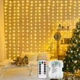 thumbnail image 1 of WarmHaven Curtain Lights Battery Operated 200 LED Curtain Fairy Lights 6.6×6.6ft with Remote Timer Outdoor Wall Light Fully Waterproof for Wedding Backdrops Bedroom Decor (Warm White), 1 of 18