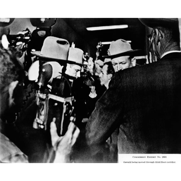 Warren Commission Exhibit. Television Screen Shot Of Suspected Jfk Assassin Being Moved Through Third Floor Corridor Of