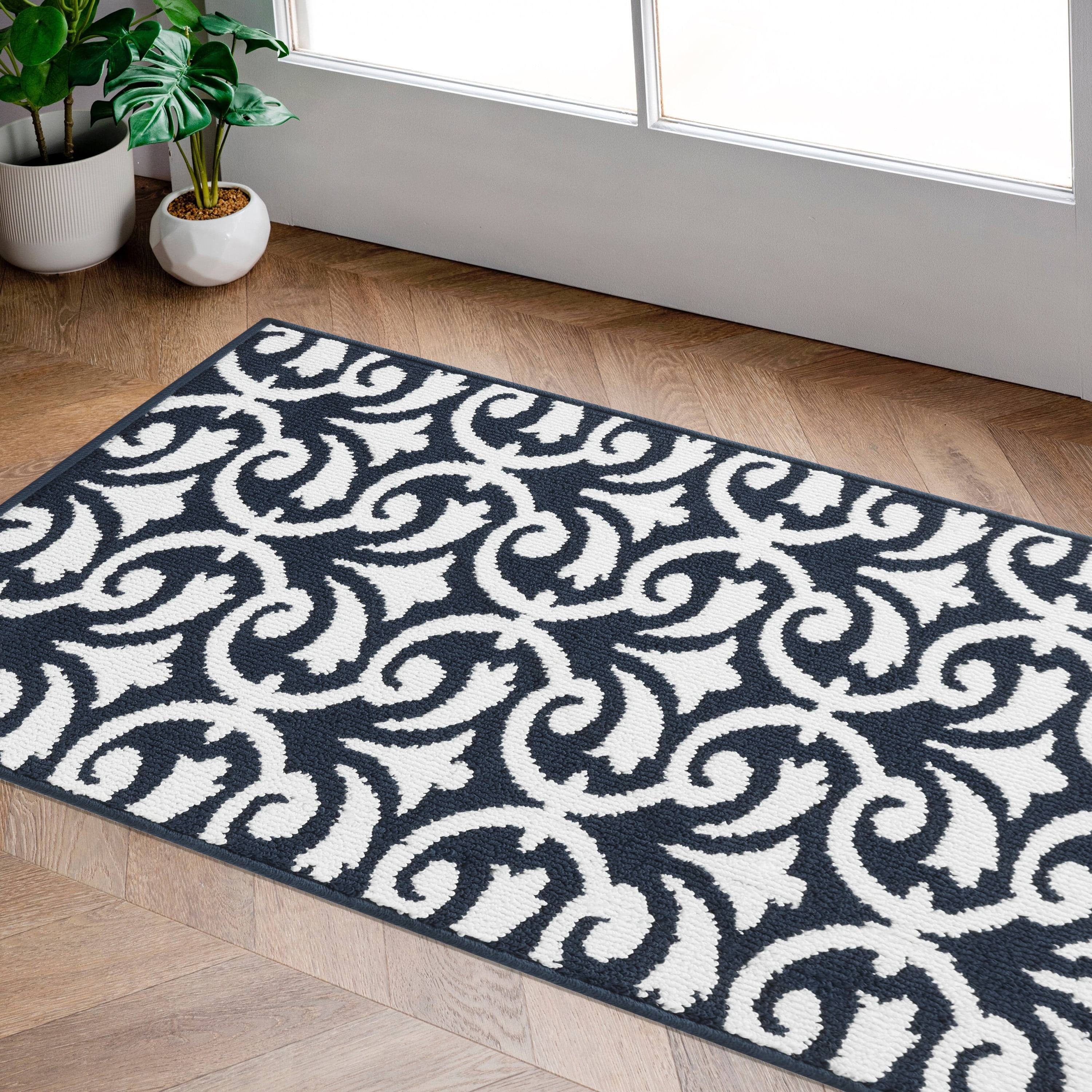 https://i5.walmartimages.com/seo/Washable-Non-Slip-Accent-Rug-Floral-Scroll-Navy-and-White-26-x-45_a4dea697-6c21-4862-8606-3b508b767a5f.497c233657a35df6eca9d6f075f8f29c.jpeg