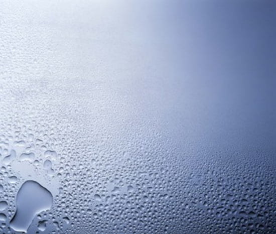 Water drops on clear glass with purple background Canvas Art - Panoramic Images (24 x 21)