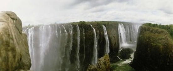 Water falling into a river Victoria Falls Zimbabwe Africa Canvas Art - Panoramic Images (30 x 13)