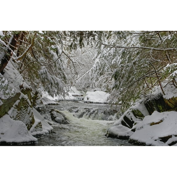 Water flowing in a river with snow covered shoreline; Fulford, Quebec, Canada Poster Print (19 x 12)