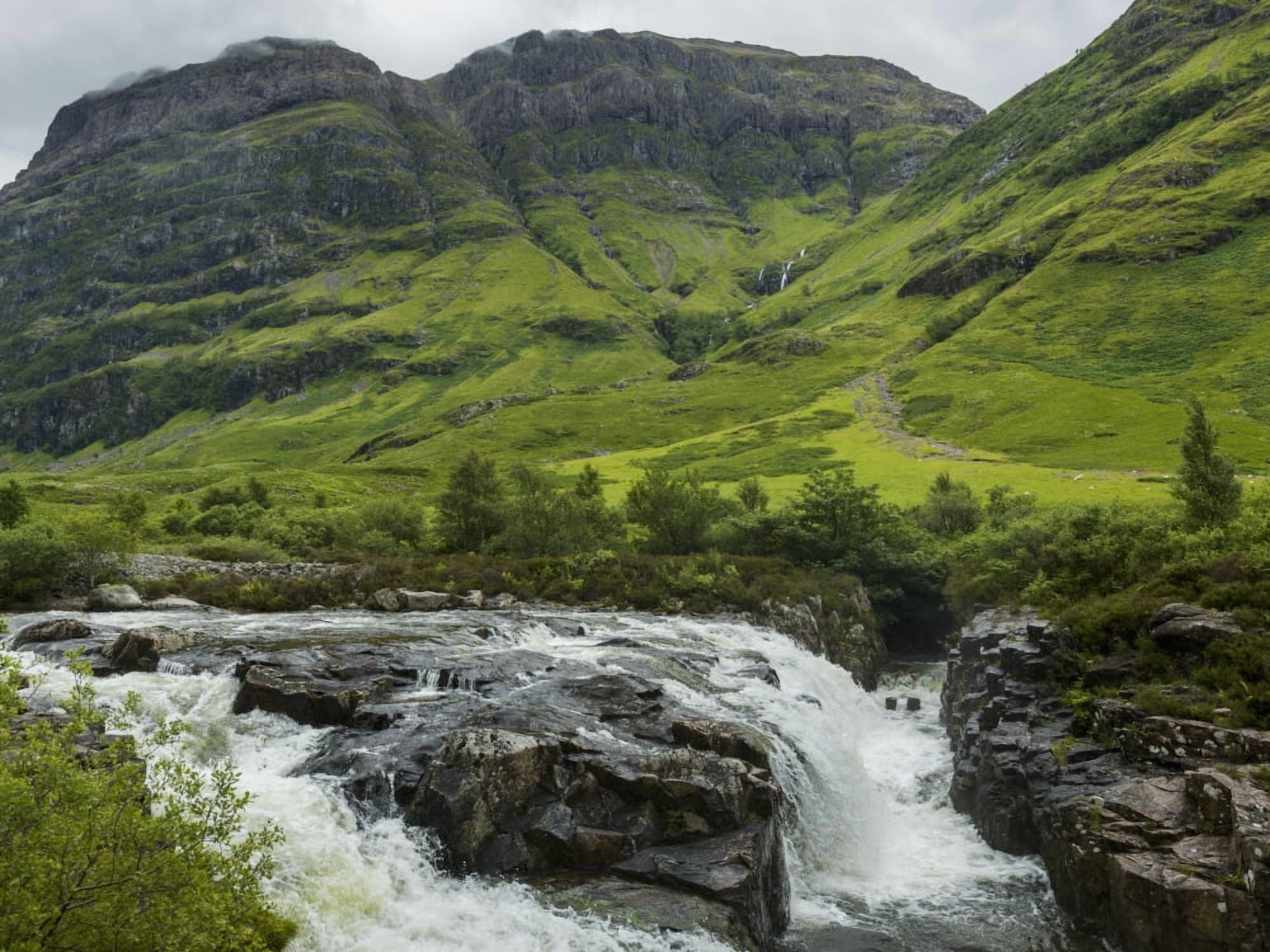 Water in a river rushing over rocks and lush grass in the hills Scotland Canvas Art - Keith Levit Design Pics (17 x 13)