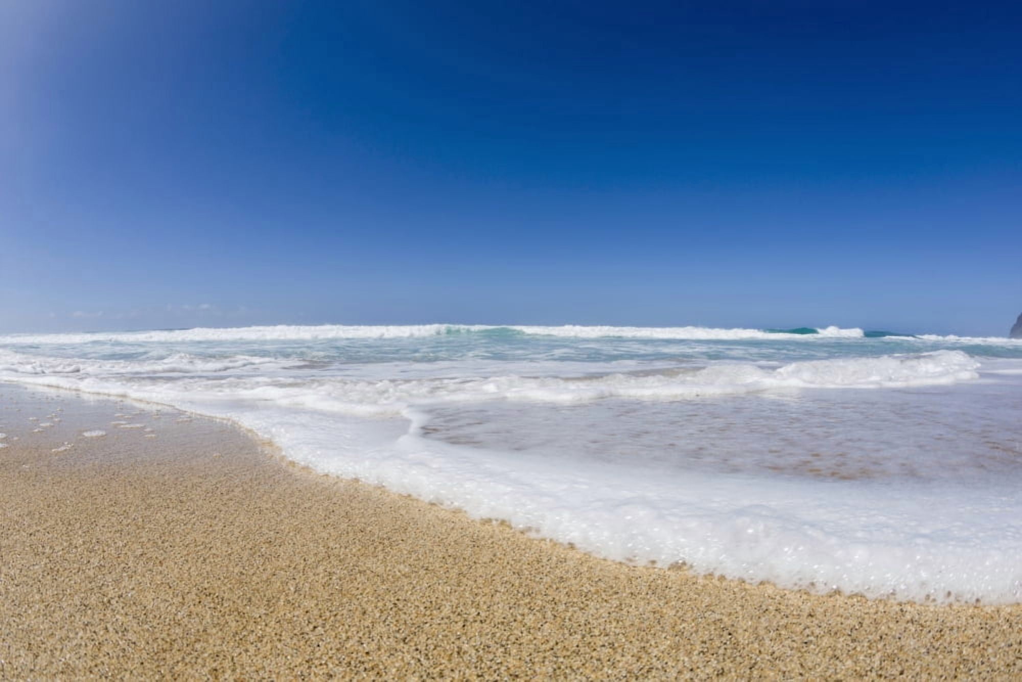 Water washing up on the beach Barking Sands (Polihale Beach) on West Kauai fish eye lens view Kauai Hawaii United States of America Canvas Art - Alvis Upitis Design Pics (38 x 24)