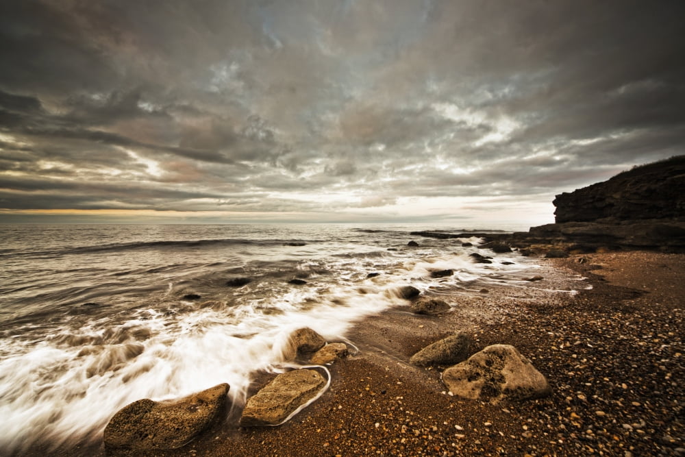 Water washing up on the shore along the coastline under a cloudy sky Tyne and Wear England Canvas Art - John Short Design Pics (38 x 24)