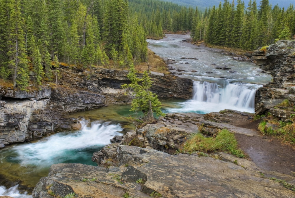 Waterfall In The Canadian Rocky Mountains Kananaskis Alberta Canada Canvas Art - Philippe Widling Design Pics (18 x 12)