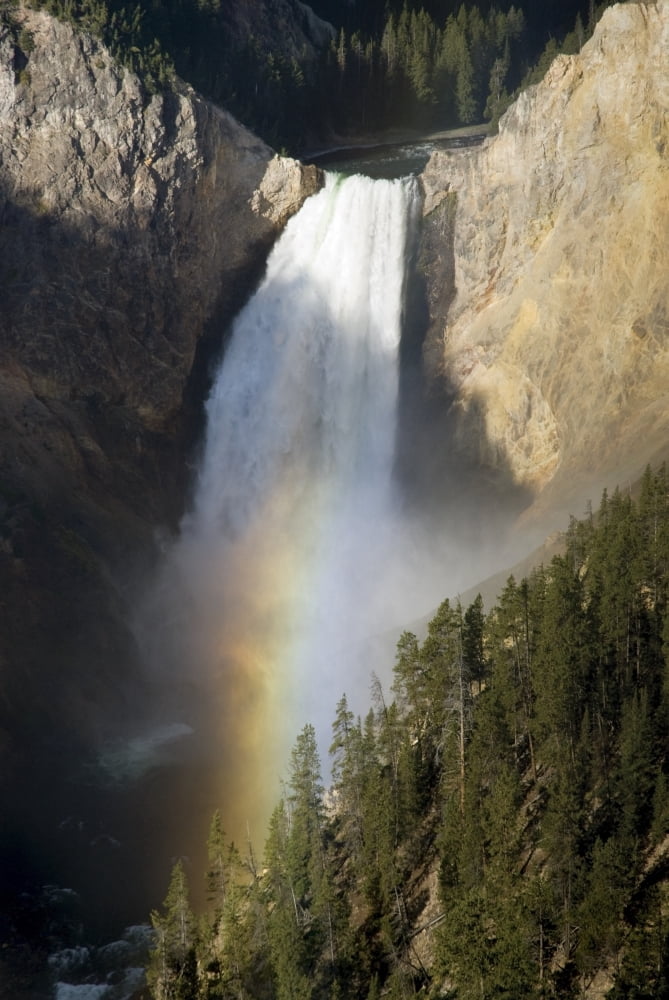 Waterfall Over Cliff Creating A Rainbow Canvas Art - Philippe Widling Design Pics (12 x 19)