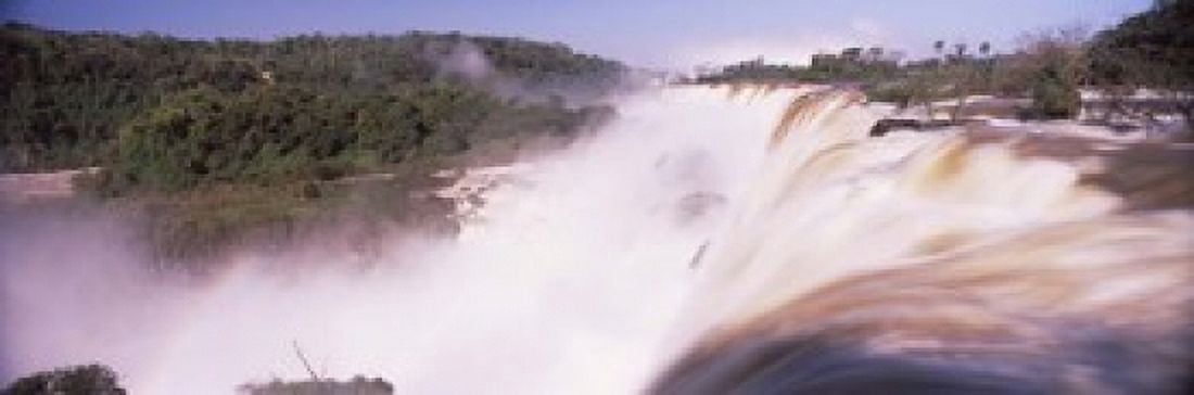 Waterfall after heavy rain Iguacu Falls Argentina-Brazil Border Canvas Art - Panoramic Images (18 x 6)