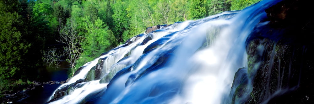 Waterfall in a forest Bond Falls Michigan USA Canvas Art - Panoramic Images (6 x 18)