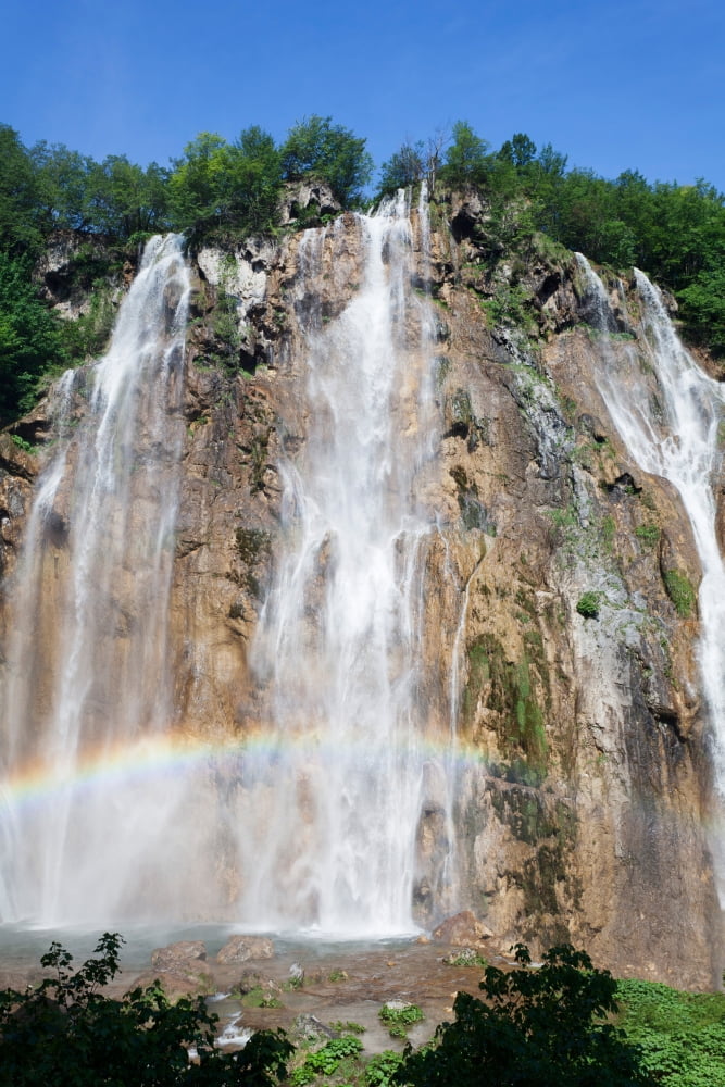 Waterfall with rainbow Veliki Slap Plitvice Lakes National Park Croatia Canvas Art - Panoramic Images (27 x 9)