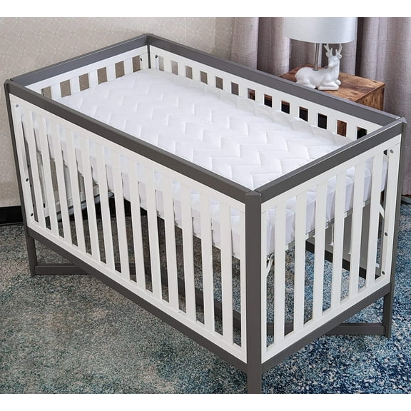 Waterguard Quilted Cotton Mattress Pad - Portacrib Size - Soft, Comfortable, and Fluffy Mattress Pad - Waterproof Mattress Protector Stretched 4" for Snug Fit on Regular Sized Mattress