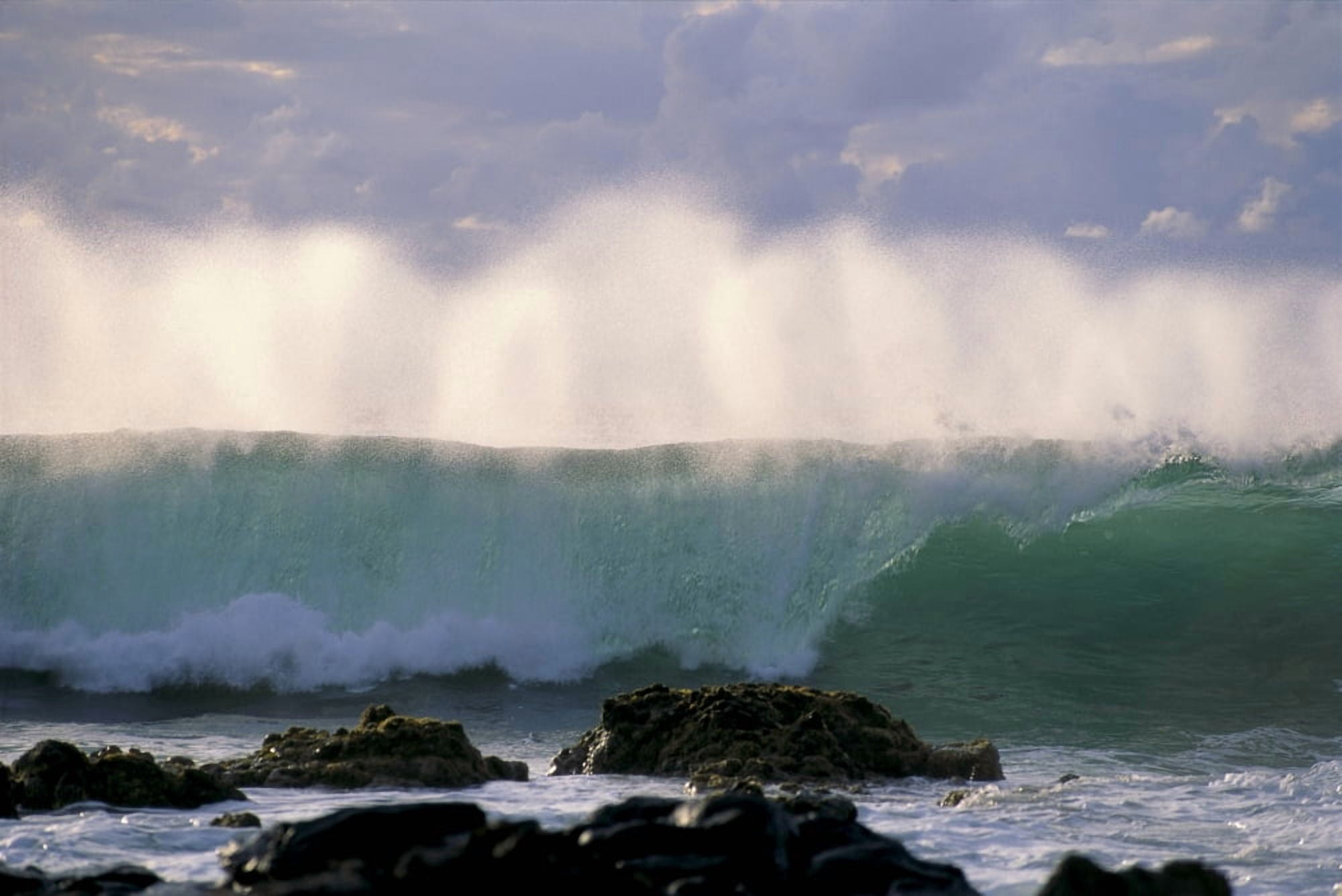 Wave Crashes On Rocky Shoreline Mist On Wave B1445 Canvas Art - Robert Sablan Design Pics (19 x 12)