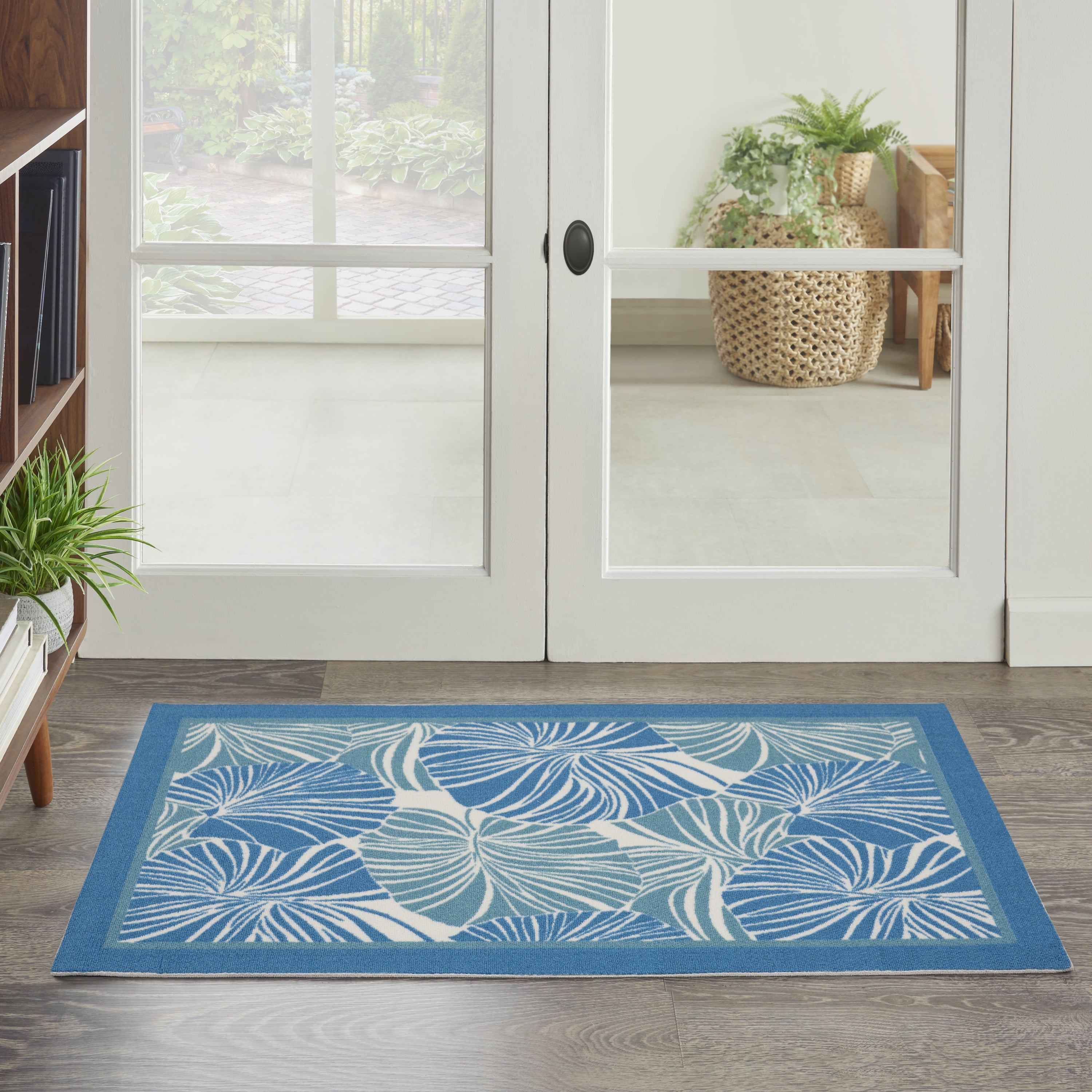 Tropical Blue and Ivory Synthetic Rectangular Area Rug 2'3" x 3'9"