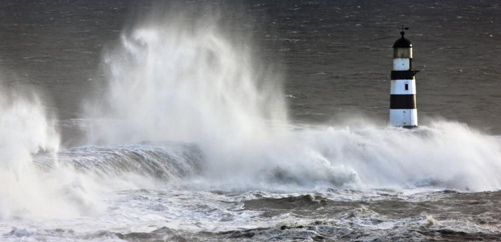 Waves Crashing On A Lighthouse Seaham Teesside England Canvas Art - John Short Design Pics (31 x 15)