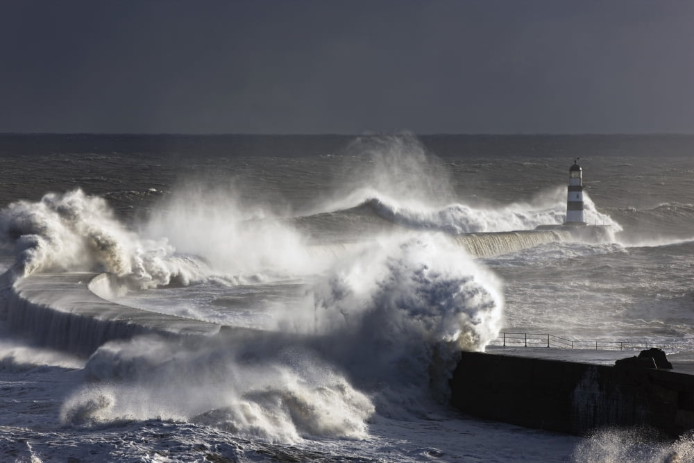 Waves Crashing On Lighthouse Seaham Teesside England Canvas Art - John Short Design Pics (36 x 24)