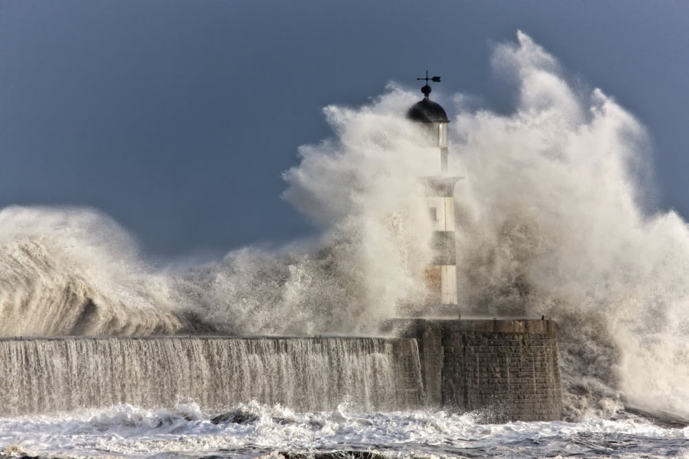 Waves Crashing Up Against A Lighthouse Seaham Teesside England Canvas Art - John Short Design Pics (38 x 24)