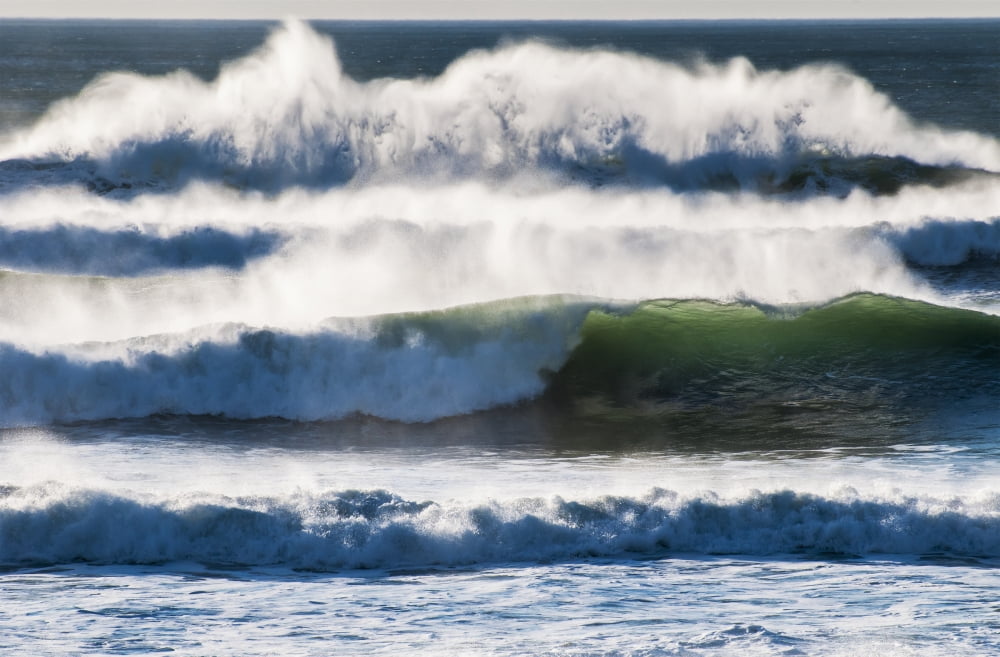 Waves break on the shore Cannon Beach Oregon United States of America Canvas Art - Robert L Potts Design Pics (38 x 24)