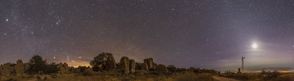 Waxing moon above the City of Rocks State Park New Mexico Canvas Art - Alan DyerStocktrek Images (27 x 8)