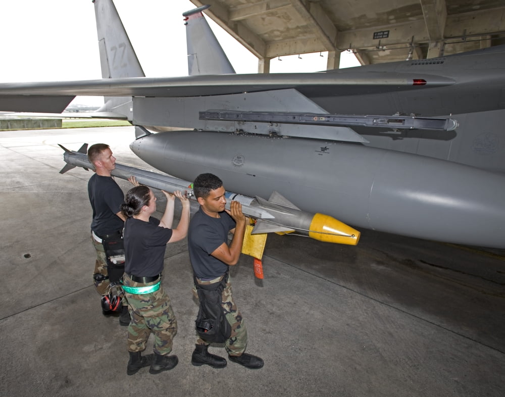 Weapons crew prepare to load an AIM-9X missile onto an F-15 Eagle Canvas Art - HIGH-G ProductionsStocktrek Images (16 x 13)