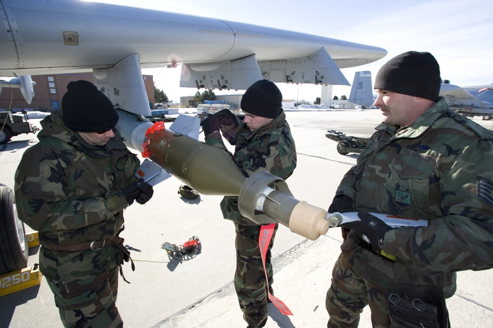 Weapons crews prepare a GBU-12 laser guided bomb on an A-10 Thunderbolt Canvas Art - HIGH-G ProductionsStocktrek Images (36 x 24)