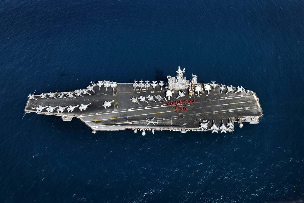 Weapons department personnel on the flight deck of the aircraft carrier USS John C Stennis Canvas Art - Stocktrek Images (35 x 23)