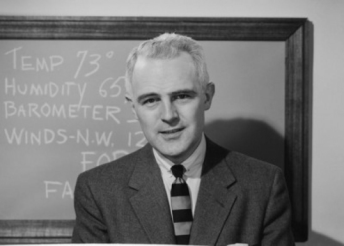 Weather presenter in front of blackboard Canvas Art - (24 x 36)
