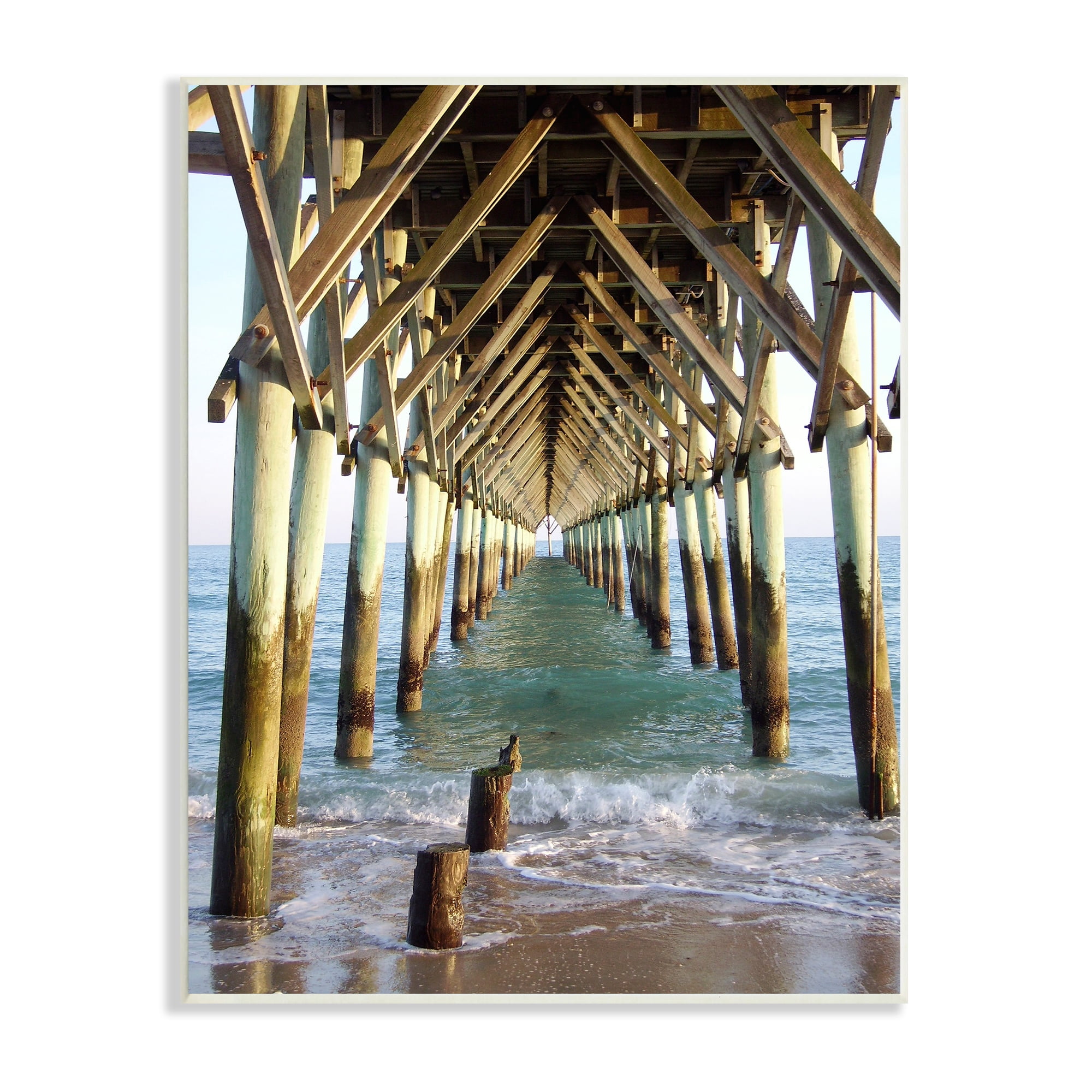 Weathered Beach Pilons Ocean Waves Under Tall Dock 10 in x 15 in Framed Photography Photographic Wall Art, by Stupell Home Décor