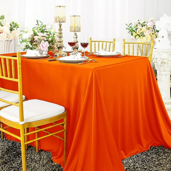 Wedding Linens Inc. 90" x 132" Scuba Wrinkle Free Rectangular Table Cover Tablecloth - Orange